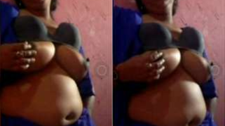 Brunette Indian aunty with sexy belly pulls bra up brandishing boobs | XXX Video on AllSex.XXX