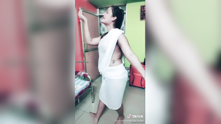 Desi girl in transparent sari dances and sings in short TikTok video | XXX Video on AllSex.XXX