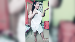 Desi girl in transparent sari dances and sings in short TikTok video | XXX Video on AllSex.XXX