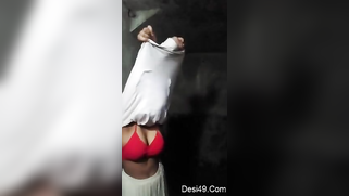 Aunty takes long-sleeve T-shirt and red bra off in empty XXX studio | XXX Video on AllSex.XXX