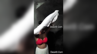 Aunty takes long-sleeve T-shirt and red bra off in empty XXX studio | XXX Video on AllSex.XXX