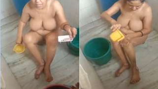 Indian aunty washes body focusing on boobs and muff in the bathroom | XXX Video on AllSex.XXX