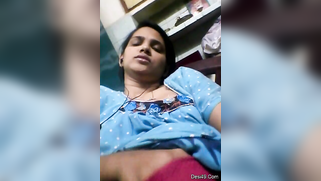 Desi whore puts hand in red panties and masturbates making XXX sounds