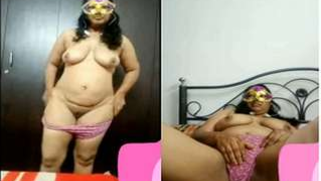 Indian aunty with mask on face gets naked and shows flabby body parts | XXX Video on AllSex.XXX