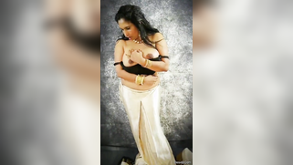 Indian aunty removes black top and pulls bra down taking hooters out | XXX Video on AllSex.XXX