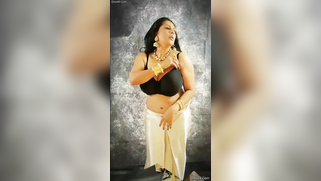 Indian aunty removes black top and pulls bra down taking hooters out | XXX Video on AllSex.XXX