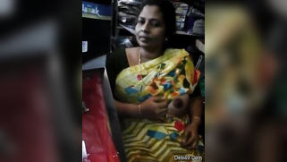 There are no customers and the Desi aunty flashes nipple in XXX video | XXX Video on AllSex.XXX
