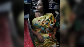 There are no customers and the Desi aunty flashes nipple in XXX video | XXX Video on AllSex.XXX