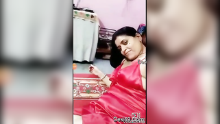 Awesome XXX treasures are hidden under Desi woman's red gown