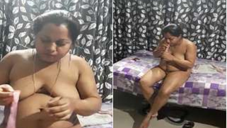 XXX video of the playful Indian aunty trying to blow up a condom | XXX Video on AllSex.XXX