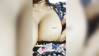 Desi woman in floral robe teases lover demonstrating big breasts | XXX Video on AllSex.XXX