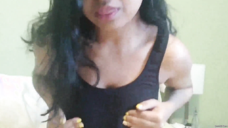 Winsome Desi with glasses undresses to masturbate pussy on the bed | XXX Video on AllSex.XXX