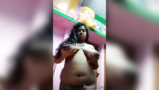 Desi camgirl lifts green dress to impress viewers with huge tits | XXX Video on AllSex.XXX