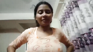 Attractive Indian takes off dress even though the boyfriend films her