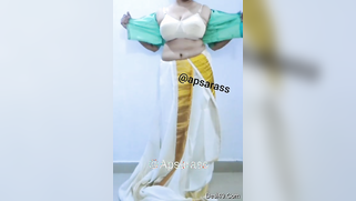 Indian is tired of dancing and she decides to take off the dress