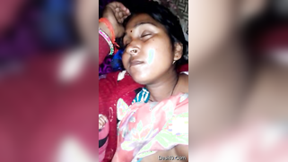 Wife is sleeping soundly while the Desi man is filming her XXX parts