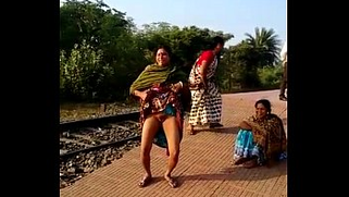 Milf aunty stripping and show pussy in the middle of the railway station