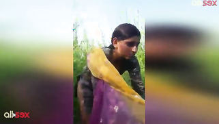 Flawless Indian chick decides to piss in the middle of the field | XXX Video on AllSex.XXX