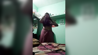 Cute Indian gal makes XXX selfie of her stripping in the bedroom