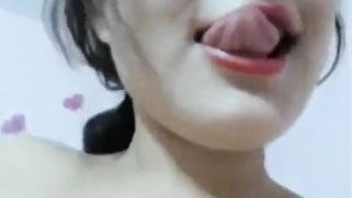 Busty Desi hottie plays with XXX melons and rubs own bald snatch