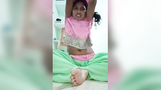 Desi girl takes clothes off item by item and sits naked before camera
