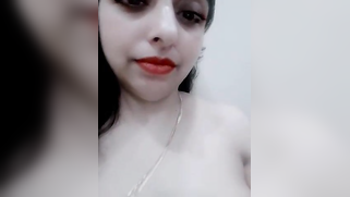 Before spreading pussy lips Indian girl smiles and exposes boobies