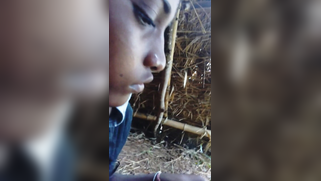 Knowing how to turn camera on Indian man films wife in the fresh air