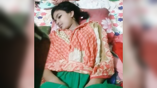 Young man films modest teen lying in bed for his own Indian sex movie