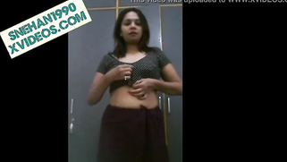 Shameless Indian MILF slowly strips and flashes boobs in XXX video