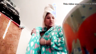 Fabulous Desi with towel on head dries herself and shows natural boobs