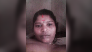 Camera slowly moves up and down to film Indian's XXX-shaped body parts