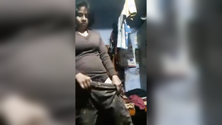 Full-bosomed Desi undresses and puts on clothes in front of the camera