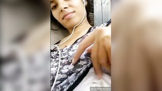 Adorable Indian girl flirts with a stranger showing left nipple