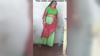 Joyful Desi woman lifts green dress to demonstrate hairy vagina | XXX Video on AllSex.XXX