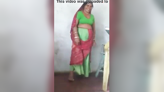 Joyful Desi woman lifts green dress to demonstrate hairy vagina | XXX Video on AllSex.XXX