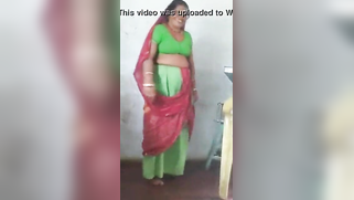 Joyful Desi woman lifts green dress to demonstrate hairy vagina | XXX Video on AllSex.XXX