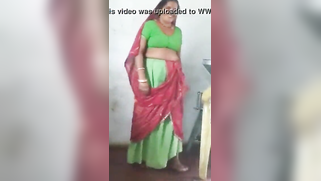 Joyful Desi woman lifts green dress to demonstrate hairy vagina | XXX Video on AllSex.XXX