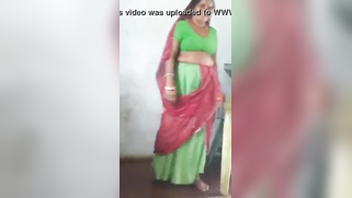 Joyful Desi woman lifts green dress to demonstrate hairy vagina | XXX Video on AllSex.XXX