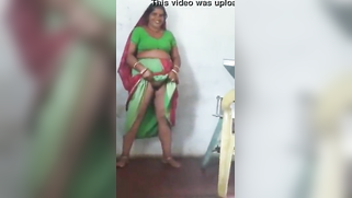 Joyful Desi woman lifts green dress to demonstrate hairy vagina | XXX Video on AllSex.XXX
