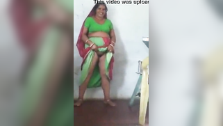 Joyful Desi woman lifts green dress to demonstrate hairy vagina | XXX Video on AllSex.XXX