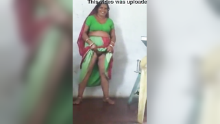 Joyful Desi woman lifts green dress to demonstrate hairy vagina | XXX Video on AllSex.XXX