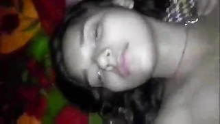 Desi girlfriend lies down on the bed and hard XXX snake invades pussy