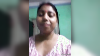 Married Bengali with a nose piercing becomes horny and touches XXX hole