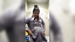 Indian woman changes clothes and flashes private parts in XXX porn