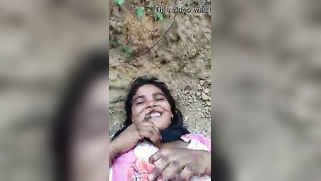 Slutty Bangla in dress lies on cold ground while XXX partner films