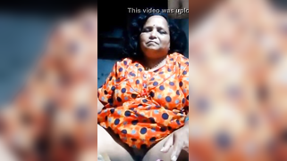 Mature chubby camgirl in orange sari dives finger in pussy in XXX show | XXX Video on AllSex.XXX