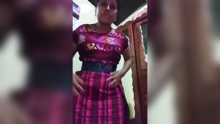 Desi MILF pulls panties down to show off hairy twat in solo XXX show