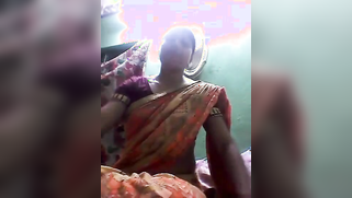 Tamil housewife seductively touches saggy tits and XXX pussy on cam