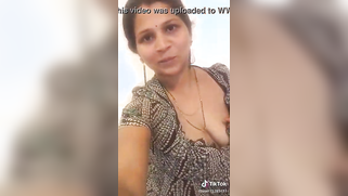 Naughty Indian aunty not shy to flash her saggy XXX melons on cam | XXX Video on AllSex.XXX