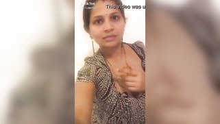 Naughty Indian aunty not shy to flash her saggy XXX melons on cam | XXX Video on AllSex.XXX